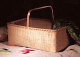 Quilt basket handwoven of fine brown ash by Stephen Zeh, Maine basket maker.