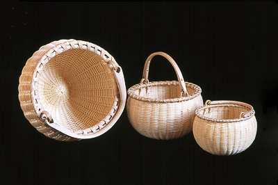 Nesting Set of Three Swing Handle Baskets hand crafted of brown ash by Stephen Zeh