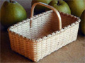 Tea Basket with pears. Hand woven of brown ash by Stephen Zeh, Maine basket maker.