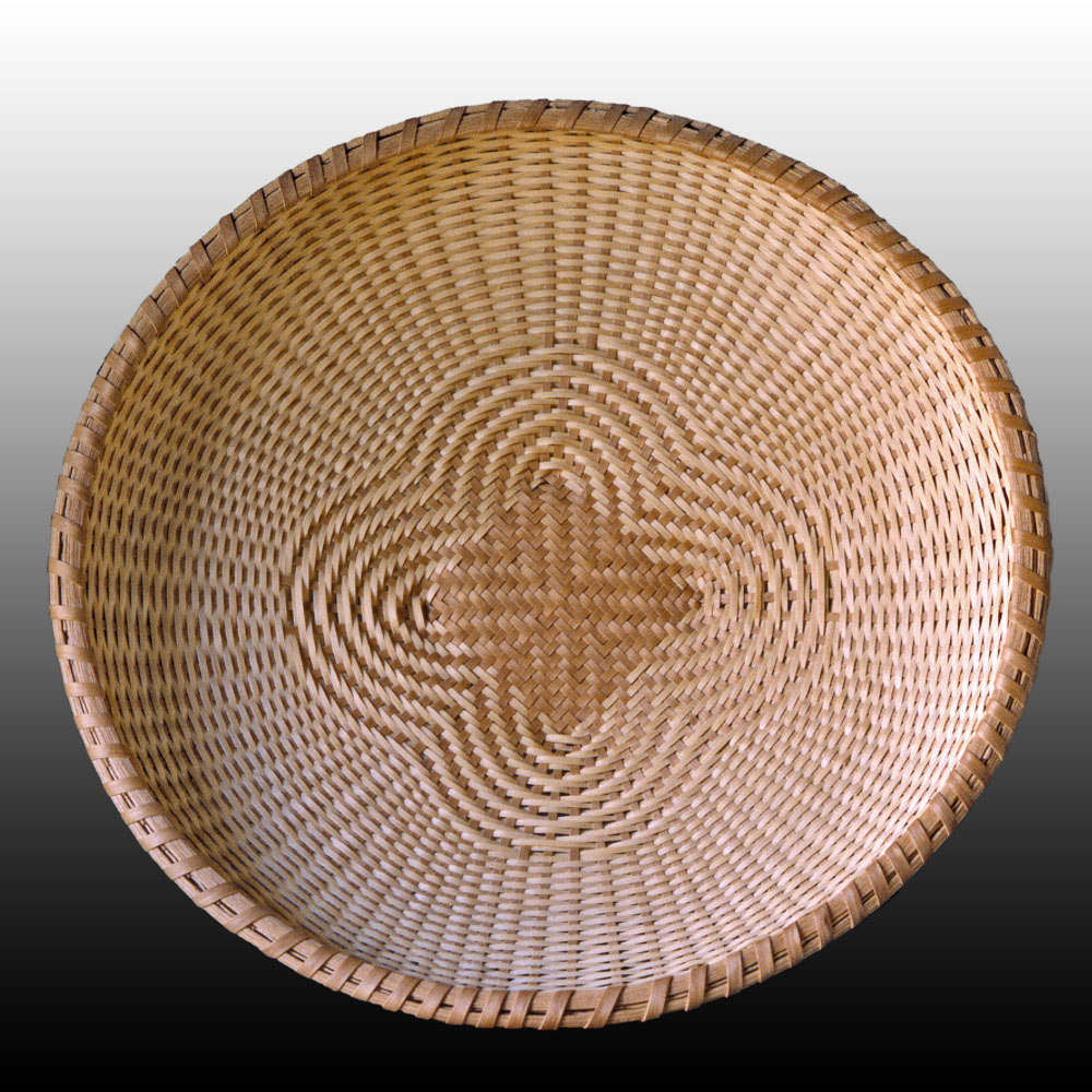 Quadrifoil weave circular basket hand crafted of brown ash by Stephen Zeh